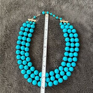 2/$20 Multi-strand, turquoise coloured necklace